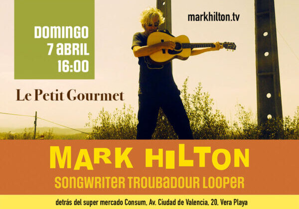 Mark Hilton playing guitar